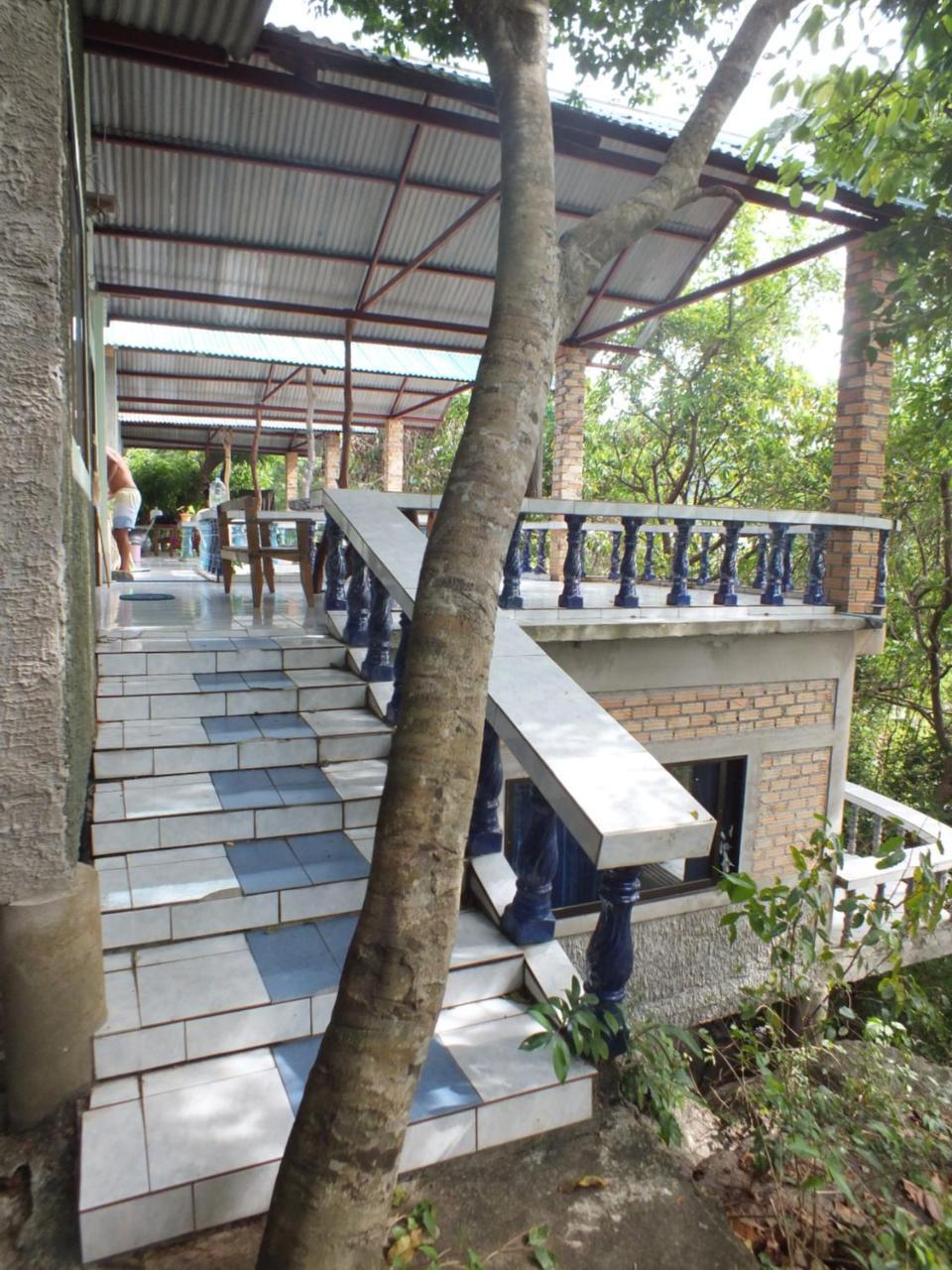 Family Room with Fan and Balcony